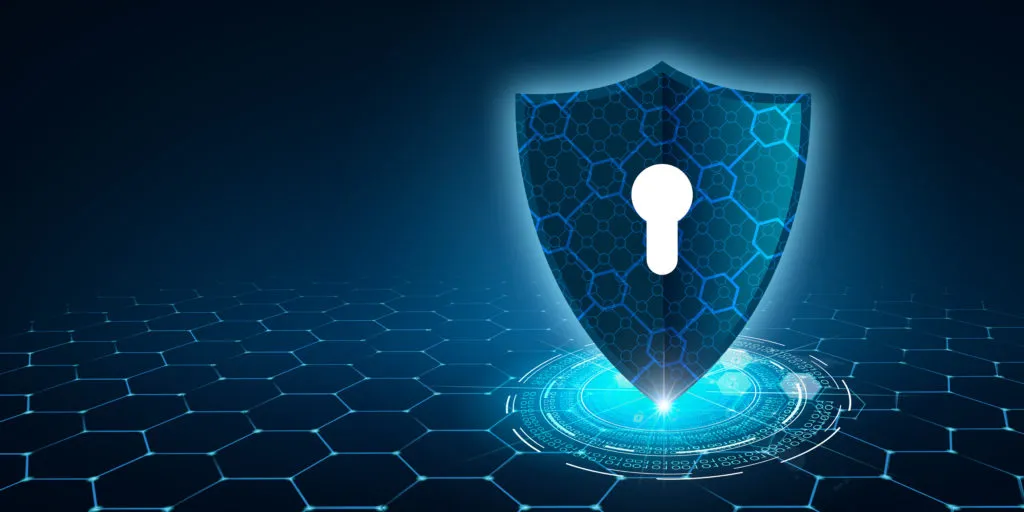 Illustration of a shield and keyhole over a hexagon grid